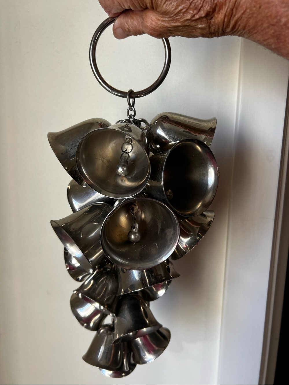 Beautiful Silver metal Sleigh bells. Over 14” long. 20 bells